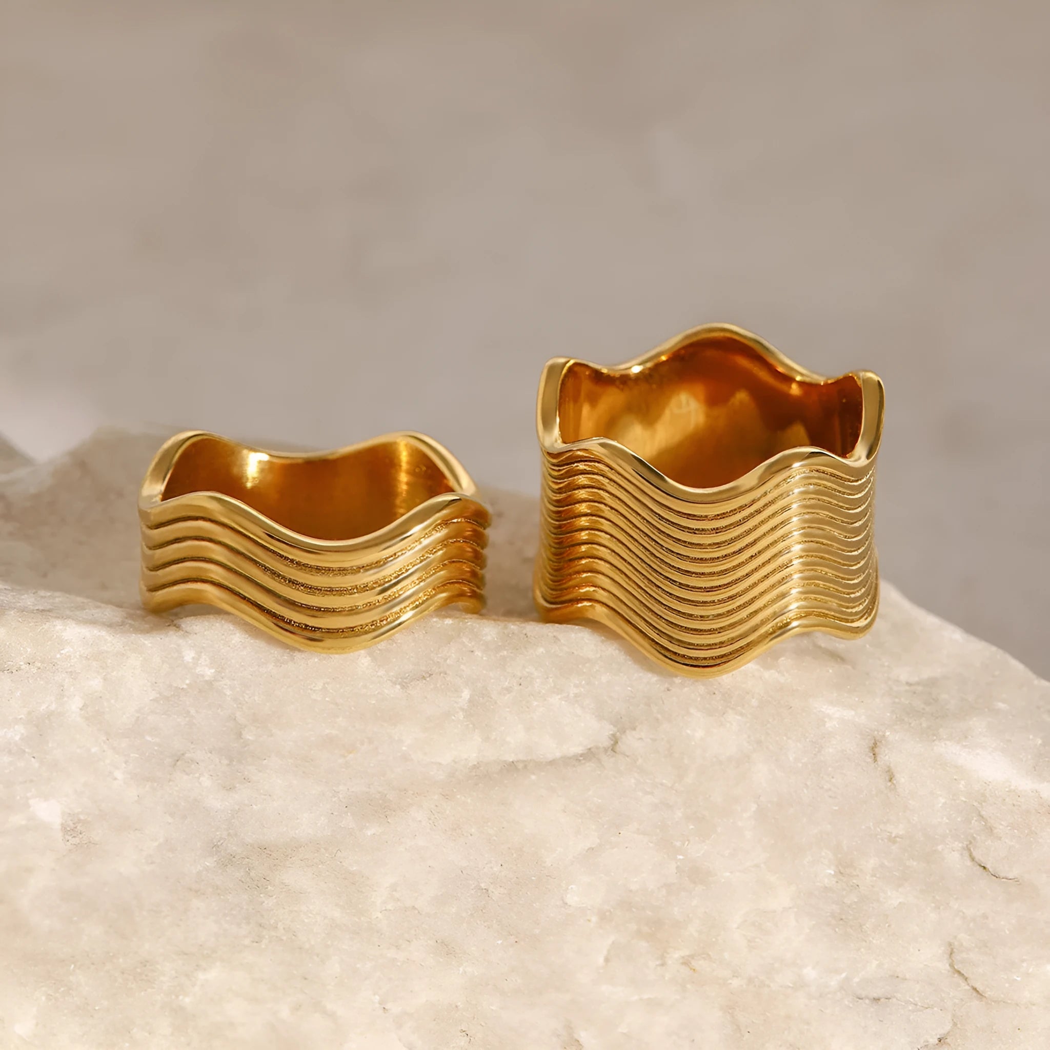 Stainless steel geometric wave ring with electroplated finish in gold or silver tone