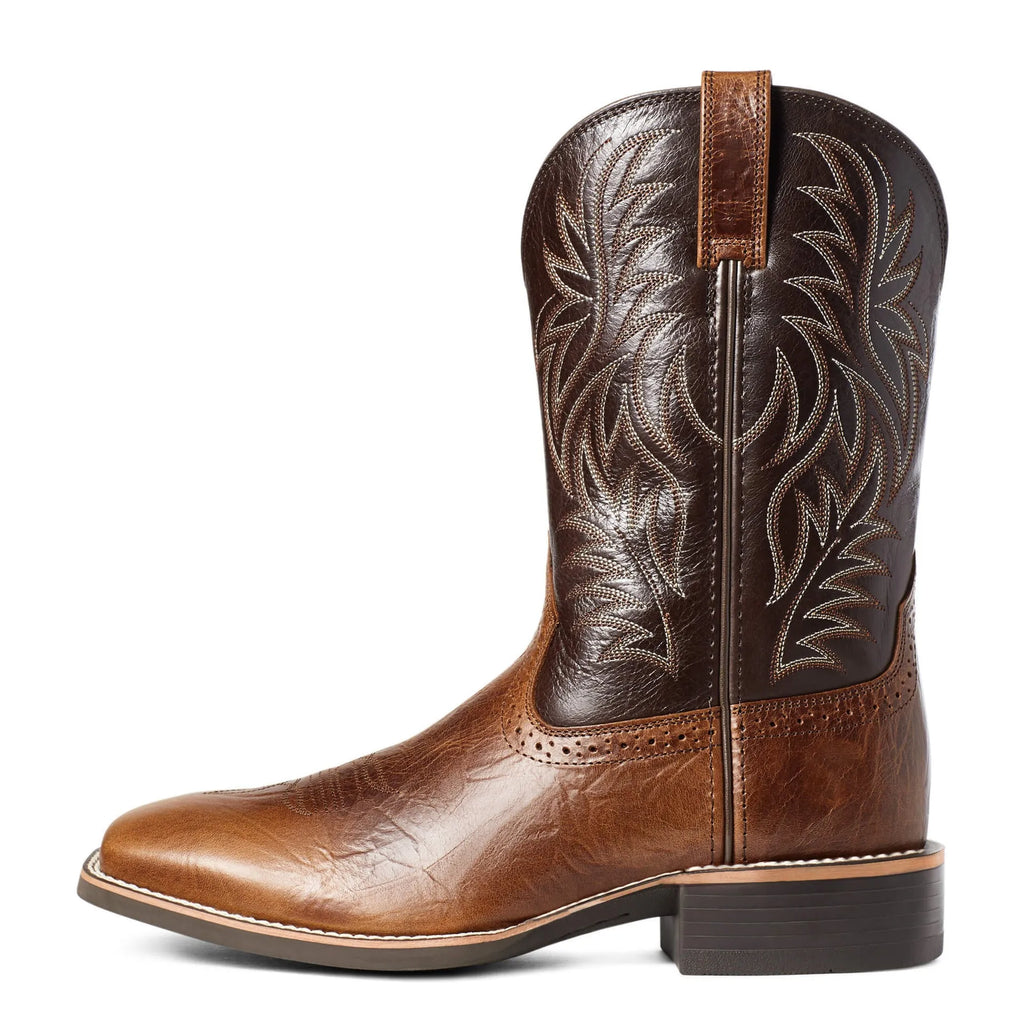 Men's black and brown western cowboy boots with detailed embroidery on a square toe and a high shaft.