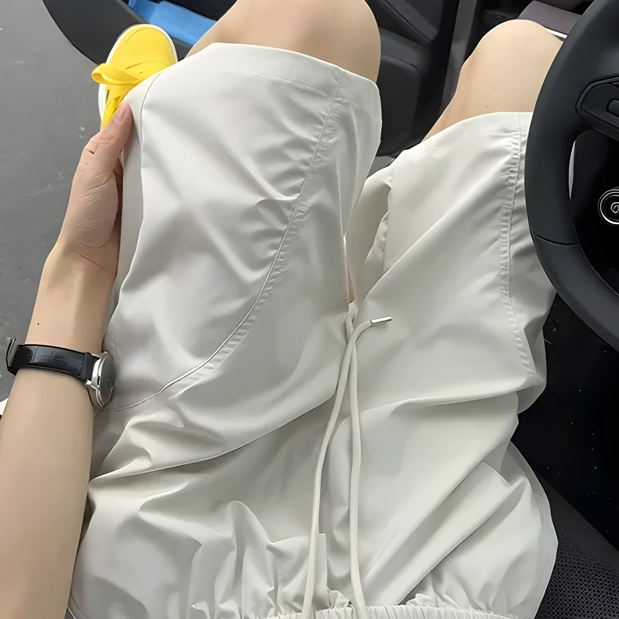 Men's creamy-white quick-drying polyester sports shorts with straight cut and elastic waistband.