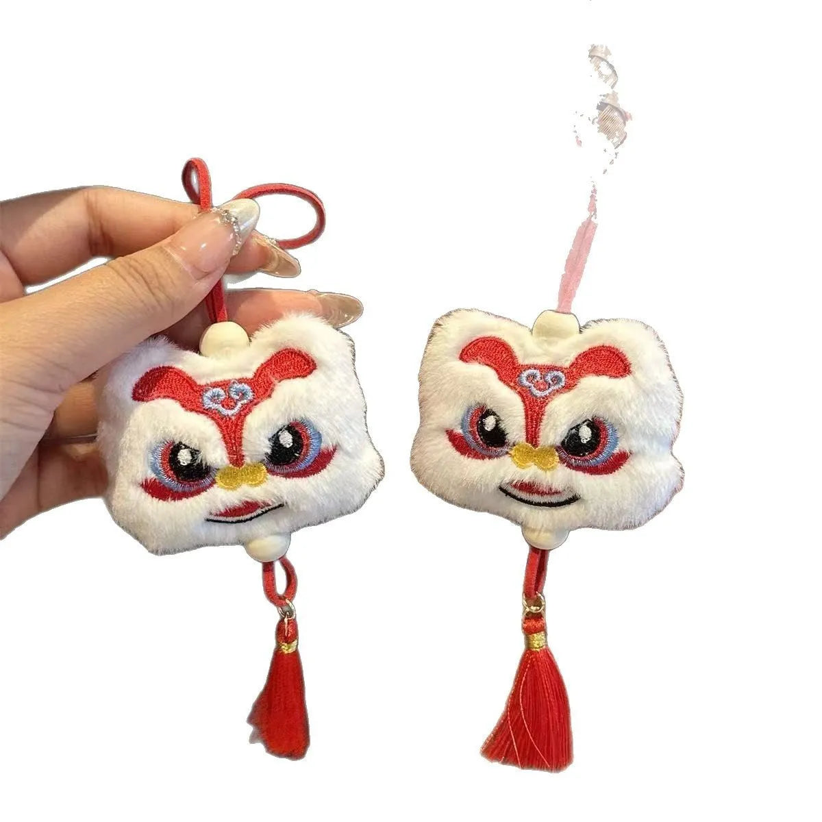 Chinese style blue plush lion keychain ornament with star stone detail and cartoon styling