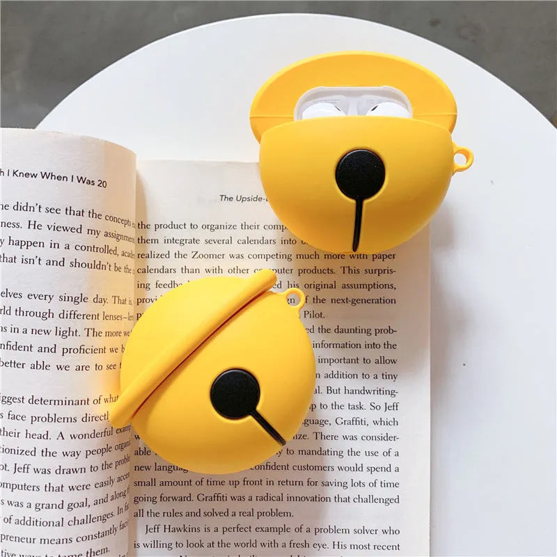 Yellow silicone protective case with small bell charm for Apple AirPods 1 and 2 charging cases