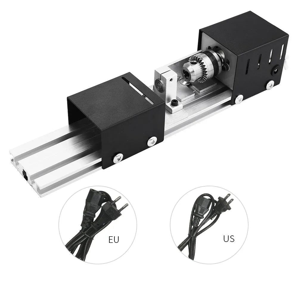 Mini silver metal manual woodworking lathe with carving knives on a workbench.