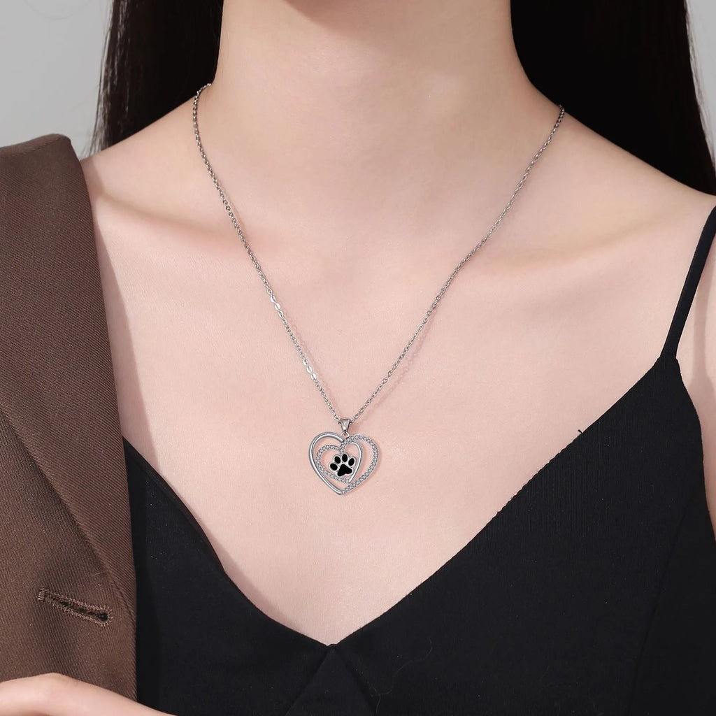 Copper necklace with heart-shaped dog paw pendant on cross chain, electroplated finish