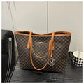 Street trend western style shoulder bag in PU material with sewn detailing, shown in black.