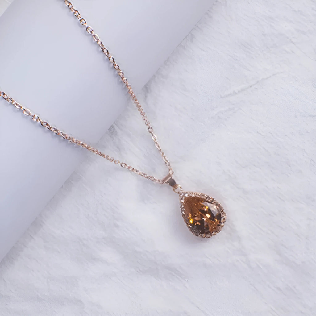 Women's rose gold water drop rhinestone necklace with geometric design and artificial gemstone inlay