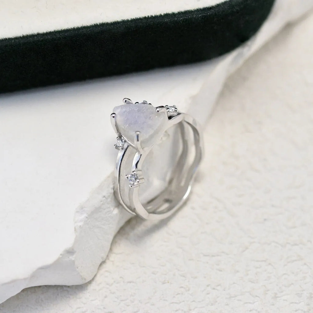 S925 silver ring with irregular triangle shape and moonstone in rose gold, white gold, or yellow gold finish.
