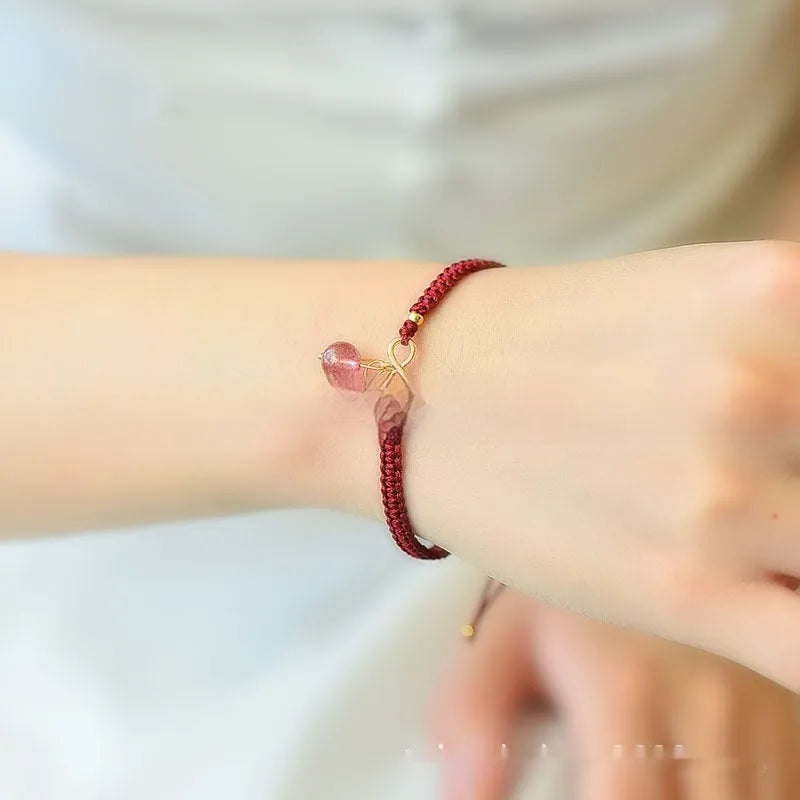 Women's crystal cherry bracelet with adjustable length in natural strawberry quartz colour