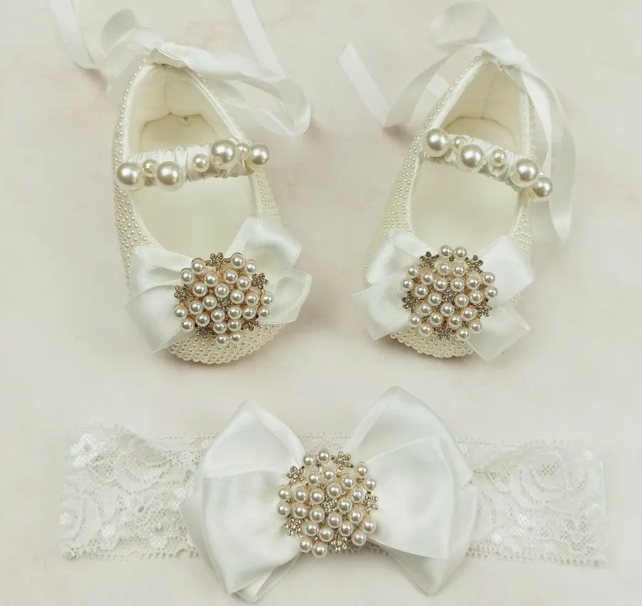 Milky white handmade soft sole cloth princess shoes with pearl detailing and lace-up closure for babies