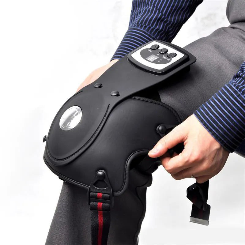 Portable infrared knee and shoulder massager unit with adjustable temperature control and pads.