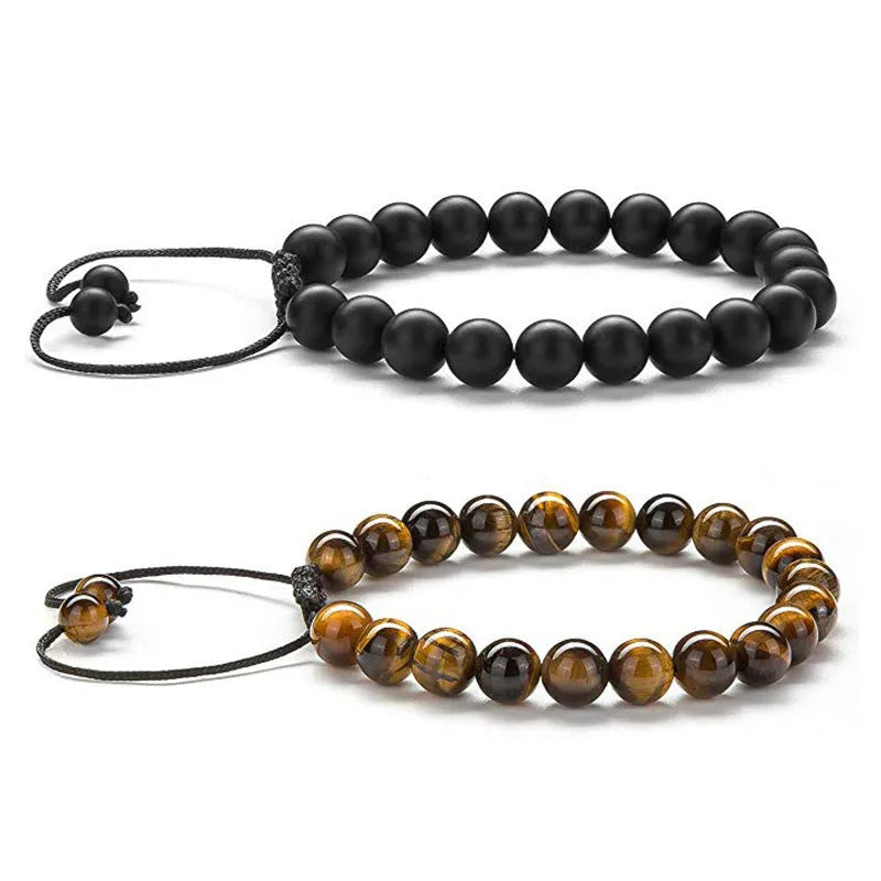 Geometric matte black agate couple bracelets with tiger eye beads, shown as a matching set.