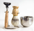 Men's shaving set with beech wood handle razor, Fe-Ni alloy holder, stainless steel soap bowl, and natural bristle brush