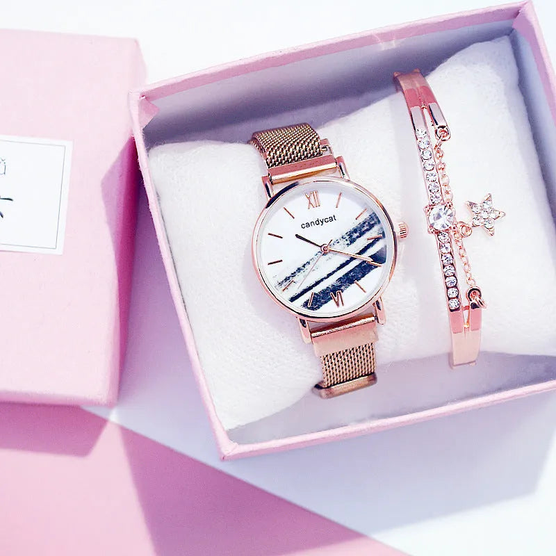 Women's retro marble watch with 32mm round dial, alloy strap, and titanium case back on white background