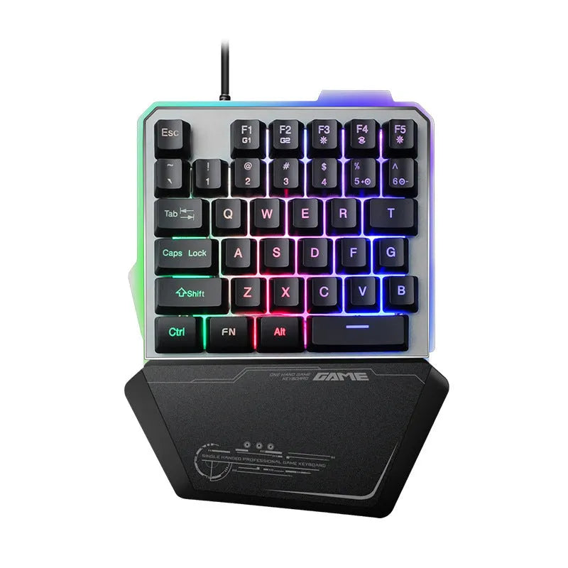 Black robotic one-handed G40 keyboard with RGB backlit keys on a desk.