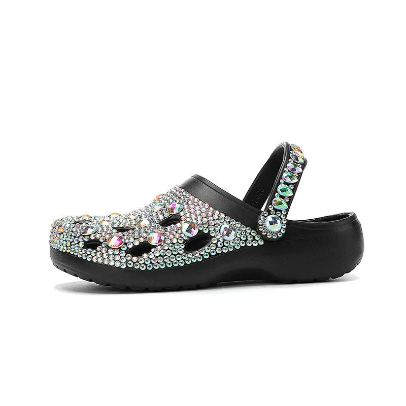 Black women's platform sandals with rhinestone details on an open hole design EVA upper.