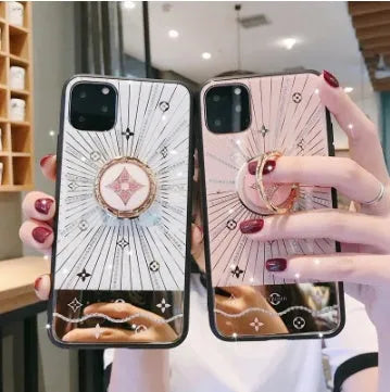 Luxury diamond and gold iPhone ring stand accessory in rose gold and white gold colours