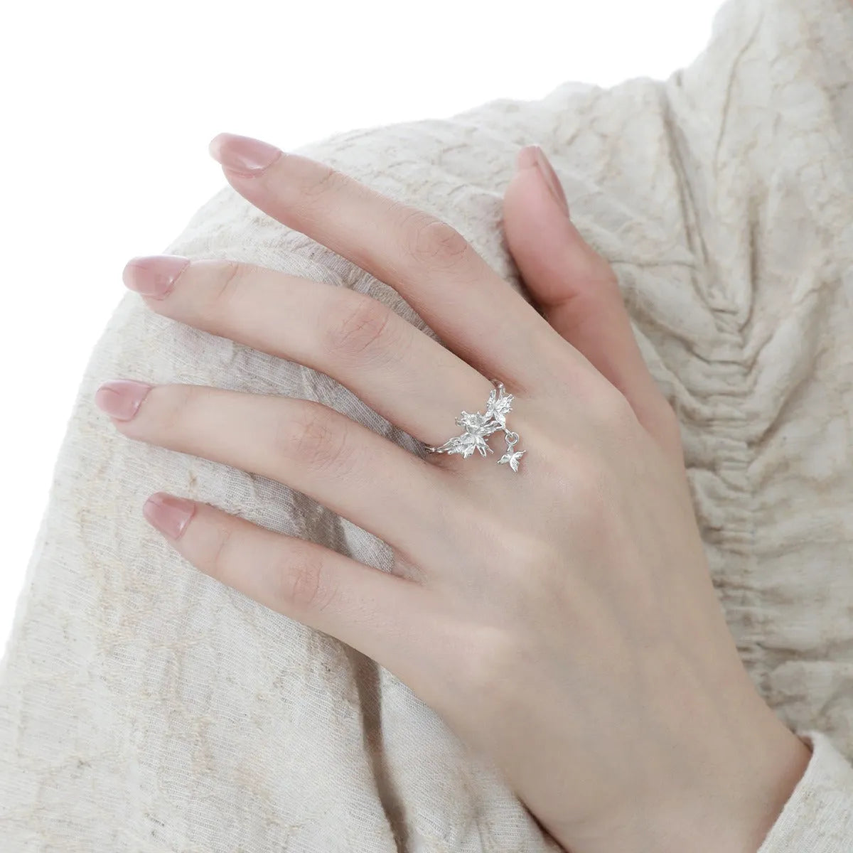 Adjustable silver ring with detailed butterfly design in white gold or 18K gold finish