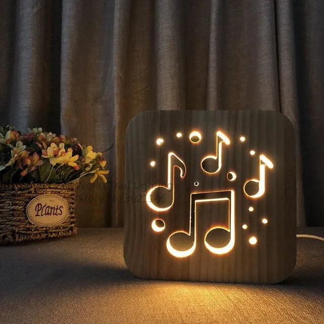 Square pine wood USB lamp emitting a warm white 3D patterned light on a surface.