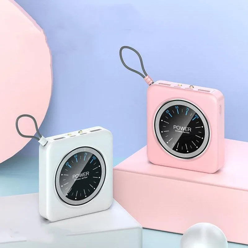 Compact alloy case mini power bank in pink, black, green, or white, showing multi-USB ports.