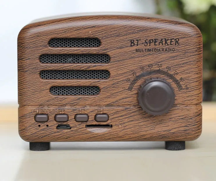 Vintage wood bluetooth speaker in wood grain finish showing compact 93x70x59mm dimensions