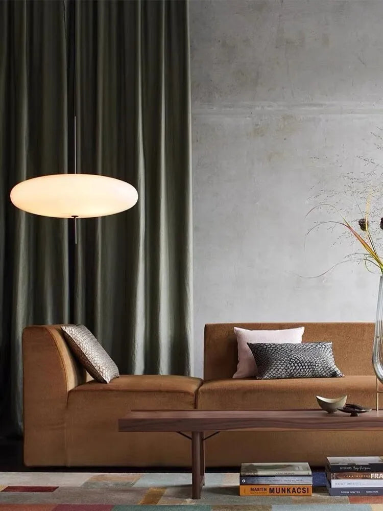Nordic modern retro UFO pendant chandelier light fitting in a black and white colour scheme.