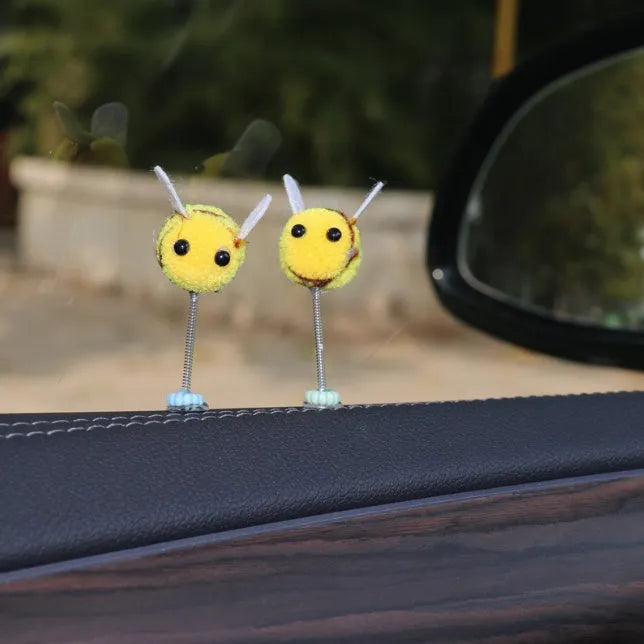 Soft fur ball bee car decoration measuring 3x3 centimetres with cartoon design