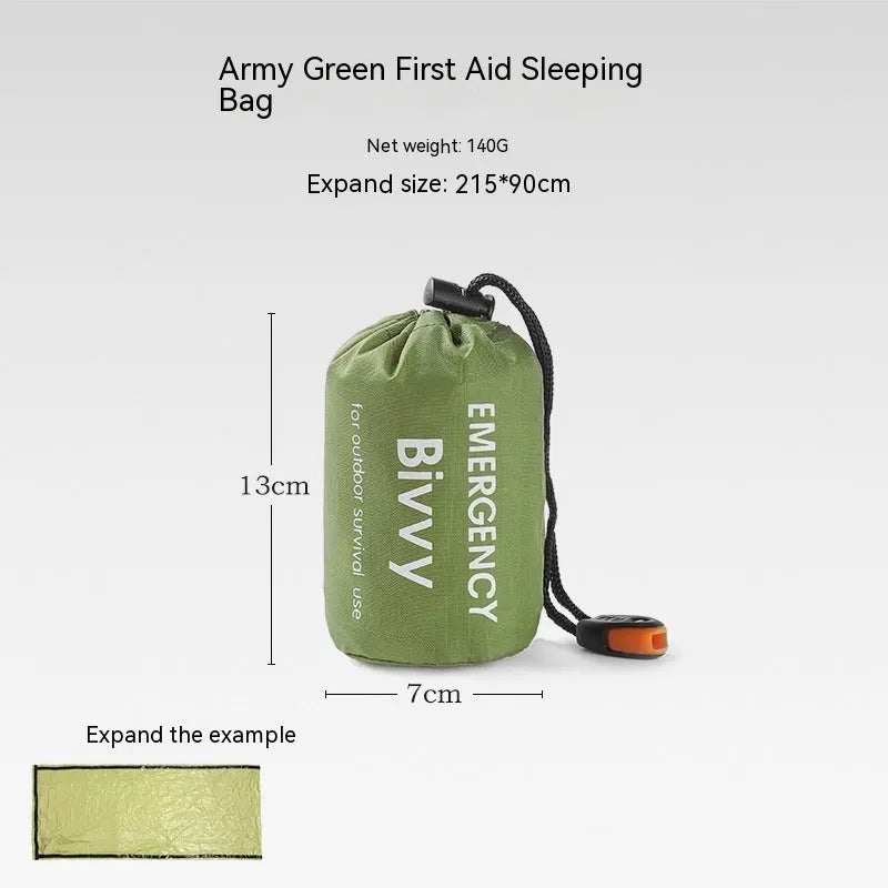 Orange emergency relief tent with sleeping bag and raincoat in temporary outdoor shelter setup