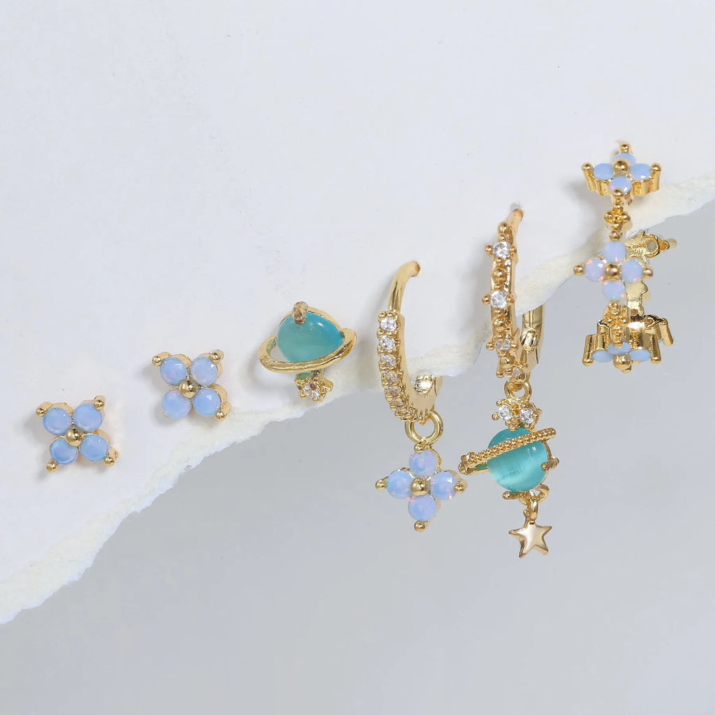 Flower shaped ear studs with blue zircon mosaic in gold and silver colour options