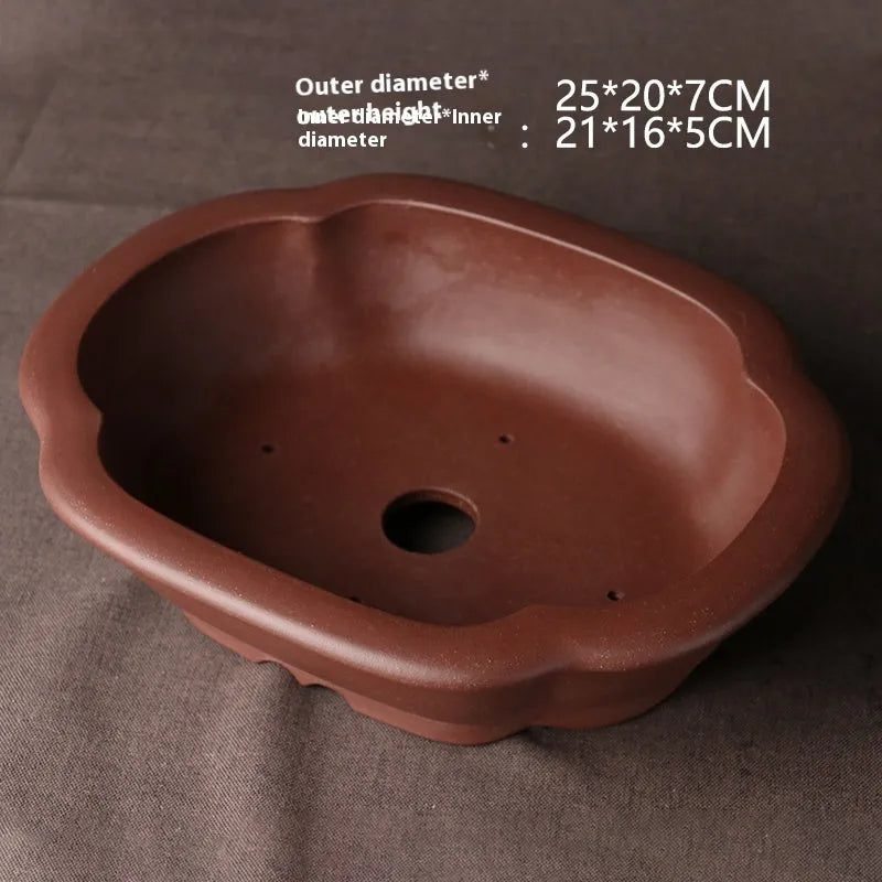 Handmade purple clay bonsai basin with Chinese classical design measuring 25x20cm