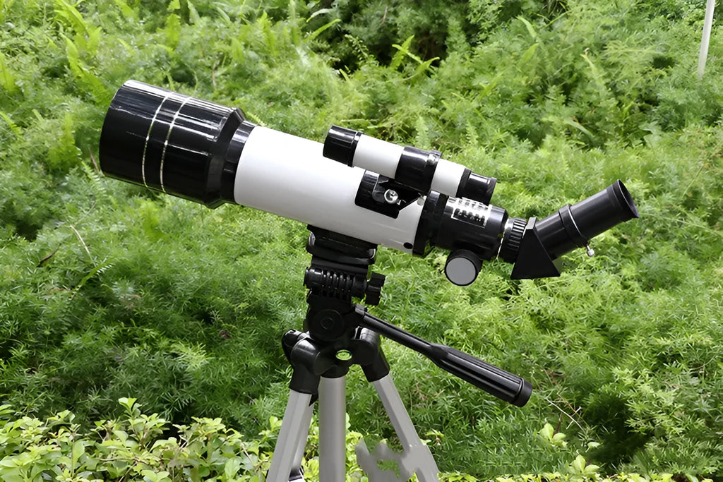 Children's dark blue astronomical telescope with tripod and accessories for stargazing