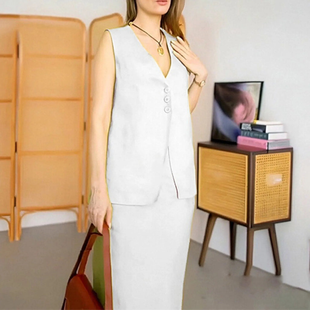 Women's loose fit blue polyester two-piece suit with sleeveless vest and long skirt.
