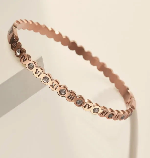 Korean style titanium steel bracelet with number detailing in gold, rose gold, or steel colour options