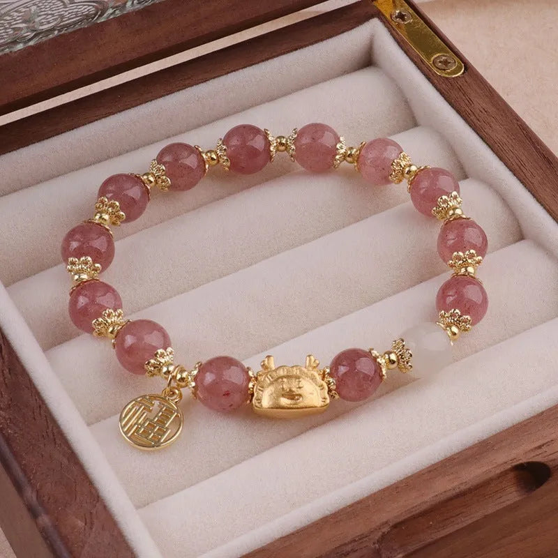 Women's floral glazed glass bracelet with animal zodiac charms in red, pink and white bead colour variations