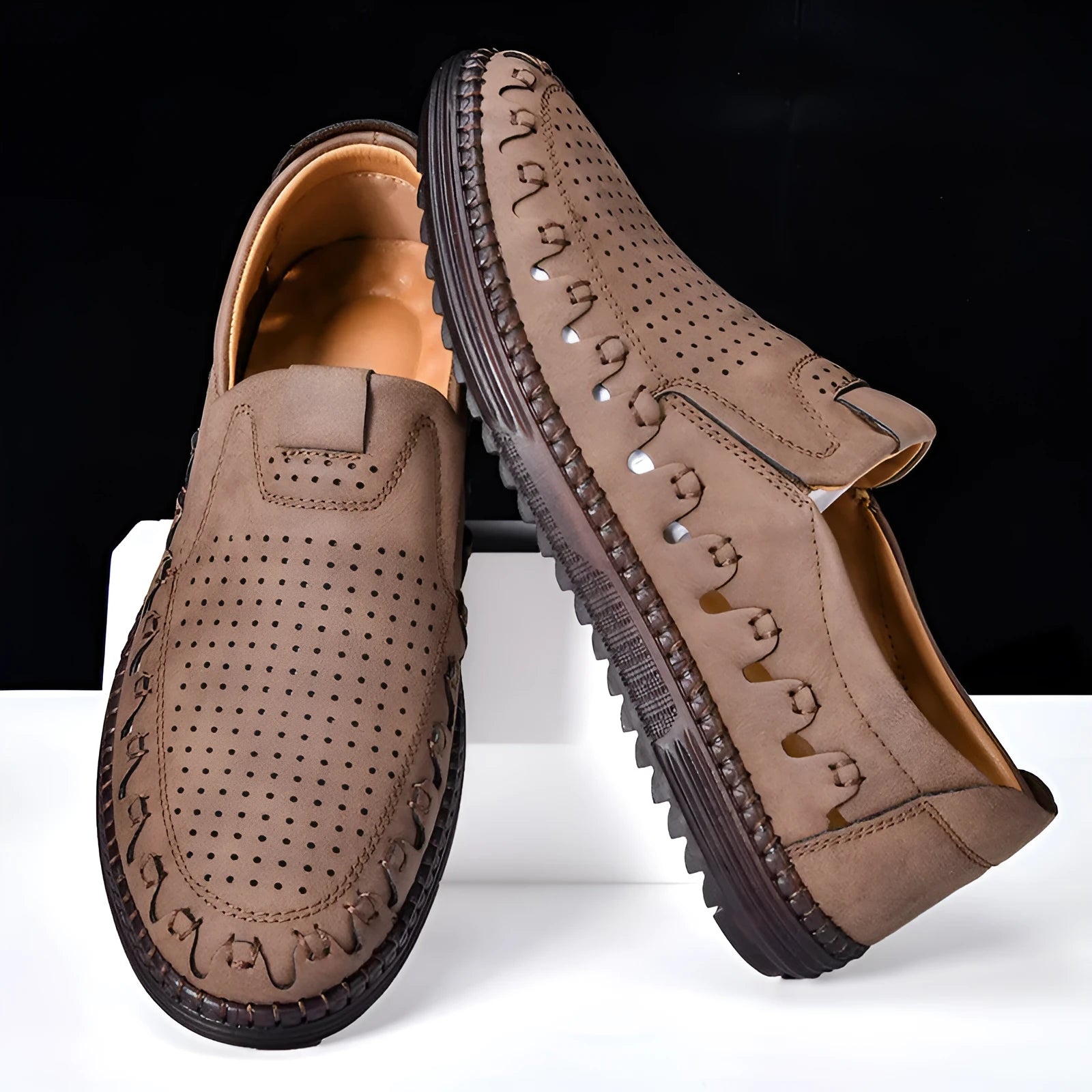 Men's brown casual slip-on shoes with round toe and flat PU leather upper.