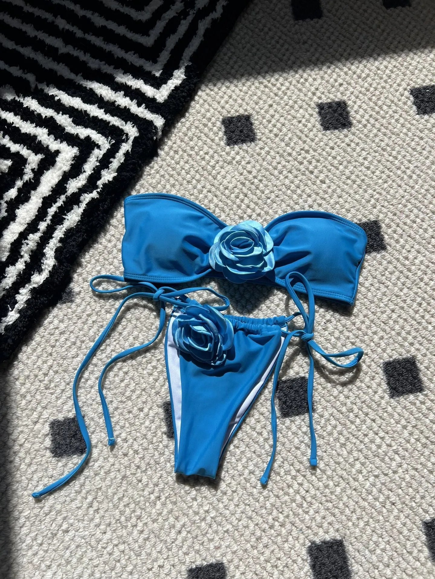 Solid colour rose tube top one-piece swimsuit for women with an adjustable drawstring strap and split style briefs.