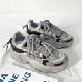 Men's white platform dad shoes with lace-up front, shown on a light background