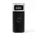 Black portable wireless air pump with metal construction, USB charging port, and 15cm inflation tube