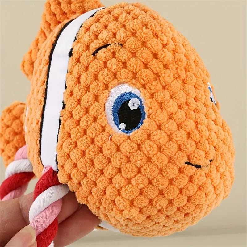 Turtle-shaped dog chewing toy with knotted texture in grey, green, or orange colour