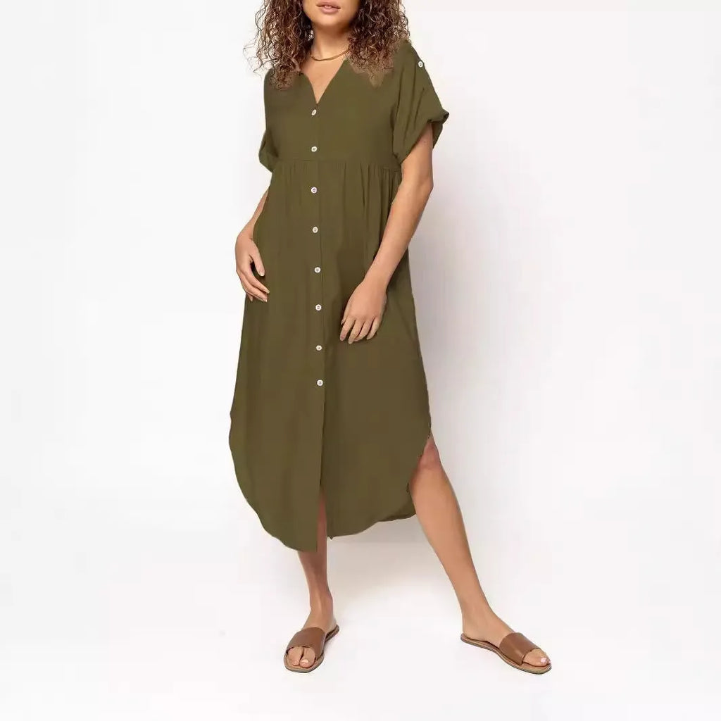 A loose-fitting, mid-length casual dress with button detail on the front, shown in a solid colour.