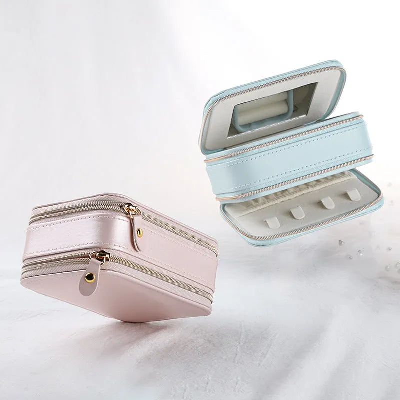 Simple zipper jewellery box in pink made from soft PU material with compact 11.5x8.5x5cm size