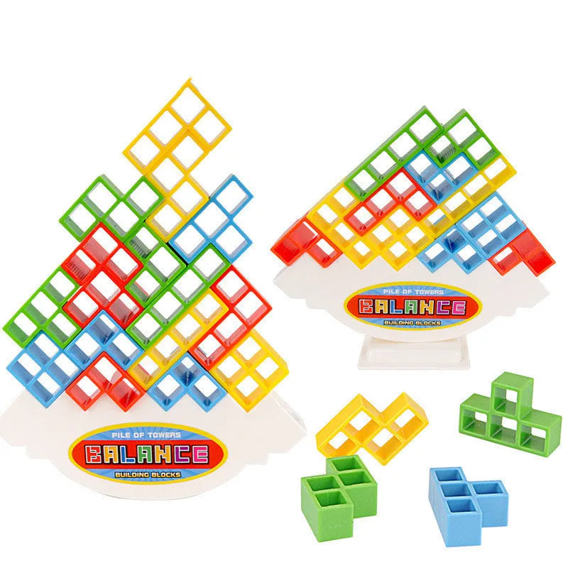 Balance stacking board game with 16 plastic coloured building blocks, base and chassis on a flat surface