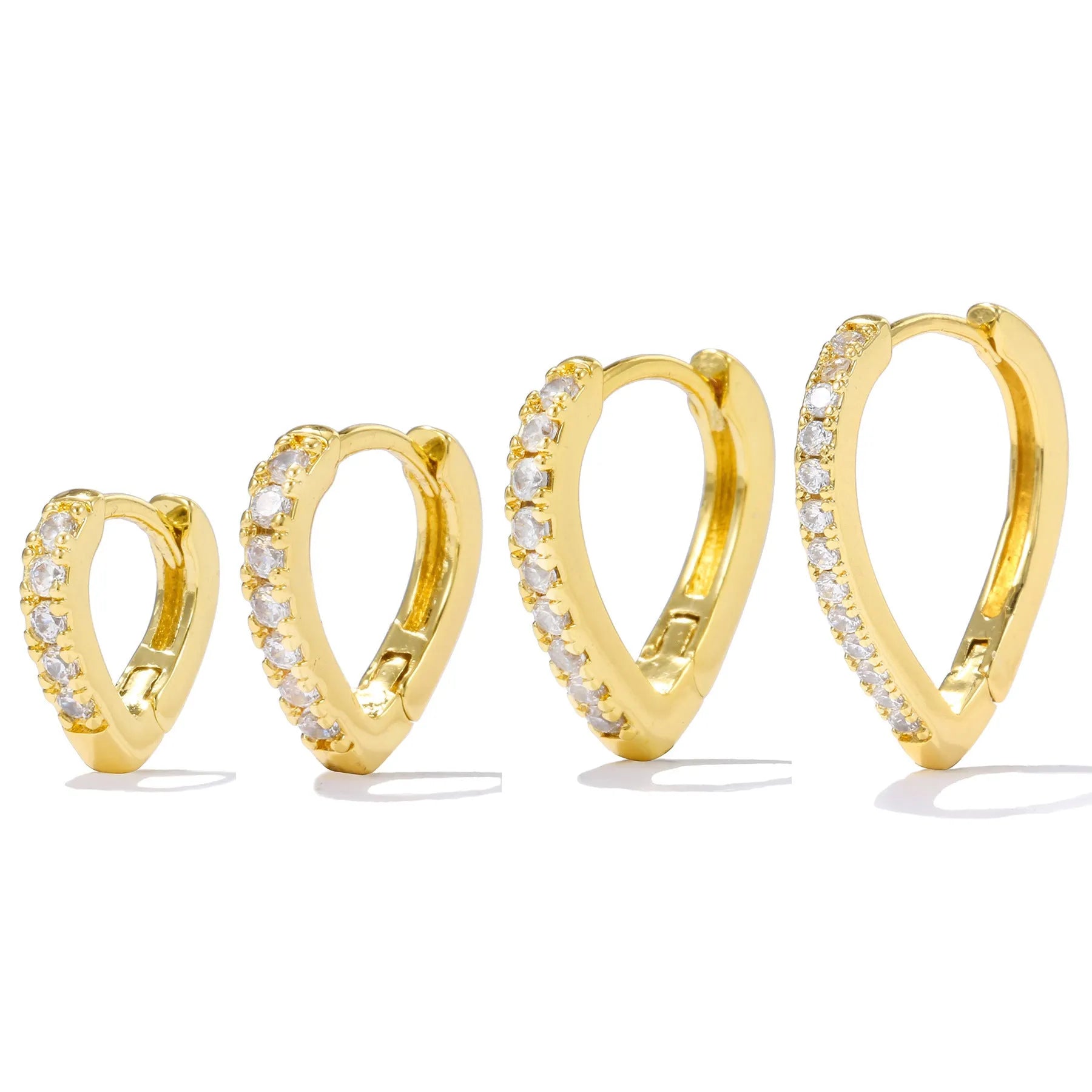 Gold geometric heart-shaped clip-on earring for women on a white background.