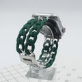 Resin splicing metal denim chain watch strap in silver on a wrist