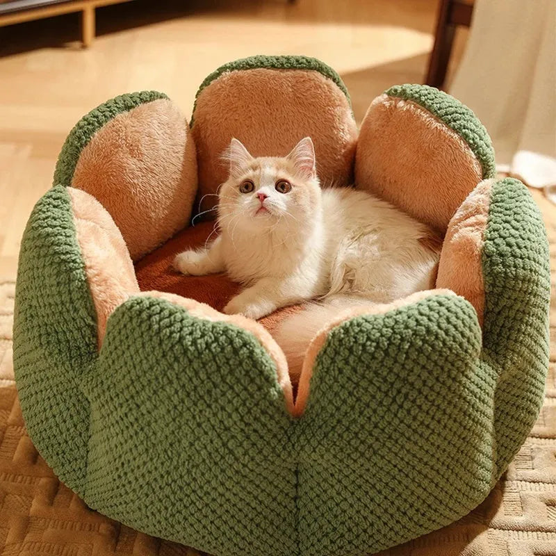Green cactus petal shape plush kennel bed for cats and small dogs on a hardwood floor.