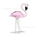 Pink crystal flamingo decorative ornament on tabletop with modern simplicity style
