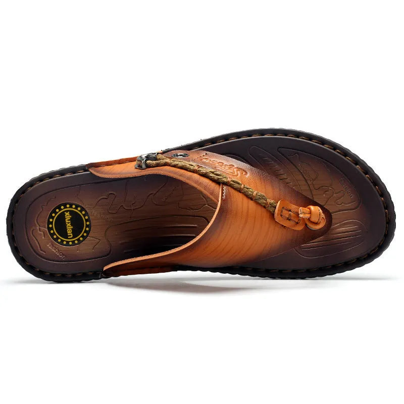Men's dark blue herringbone pattern outdoor slippers with a rubber sole, shown from the side.