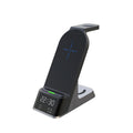 Black multifunctional alarm clock wireless charger showing digital display and charging pads for phone, watch, and earbuds