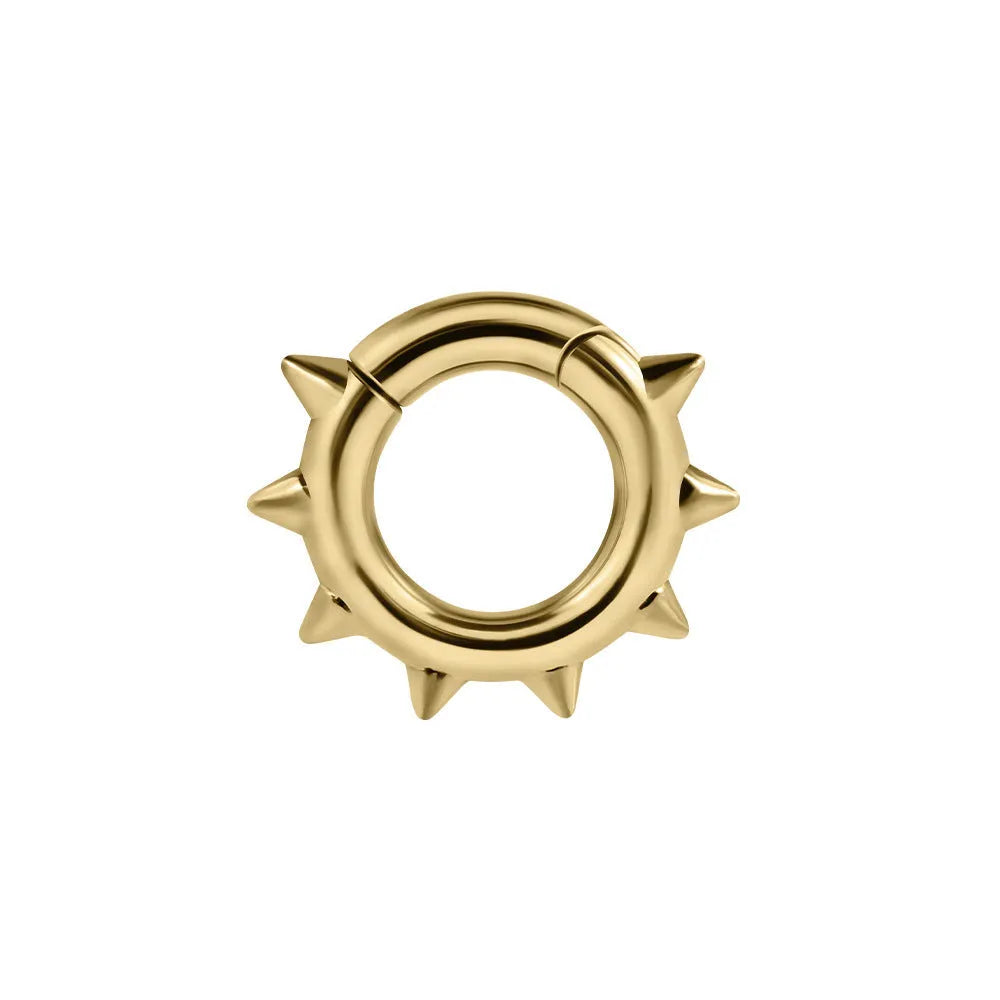 A pair of geometric cone and round shaped copper ear cuffs with magnetic clip-on fasteners.