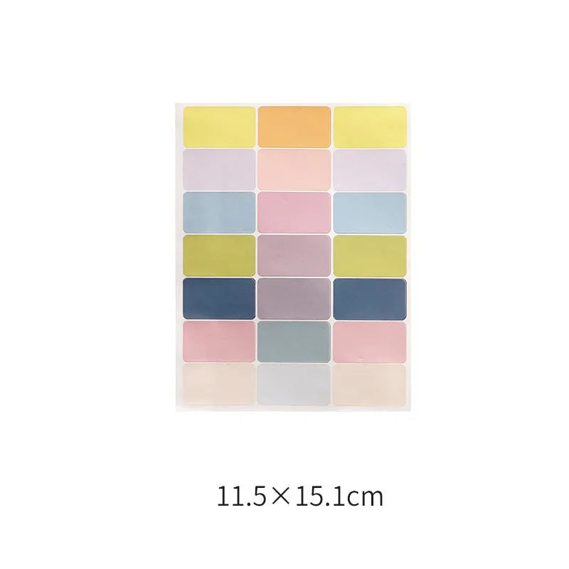 Handwritten labels and adhesive stickers with grid patterns on paper material