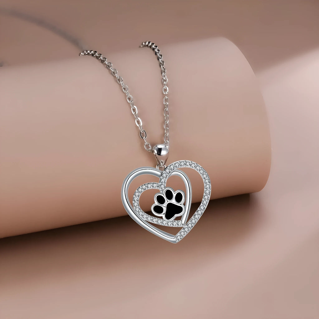 Copper necklace with heart-shaped dog paw pendant on cross chain, electroplated finish