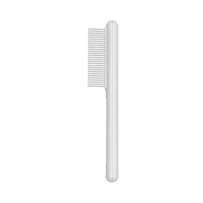 Cat comb with rounded stainless steel teeth and ergonomic handle on white background